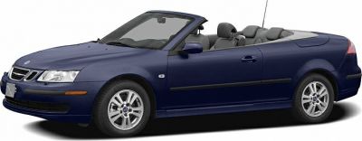 Blue convertible car with sleek body and soft top down
