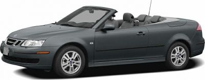Side view of a 4-seat soft top convertible with open roof