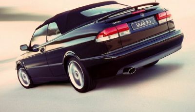 Rear view of a convertible with distinctive tail lights and sporty soft top roof