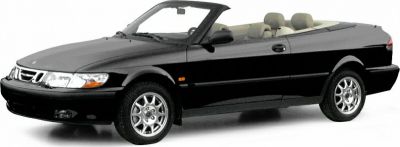 Black convertible with beige leather interior and multi-spoke alloy wheels.