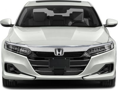 Sleek headlights and bold front grille design of a modern sedan.