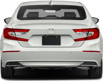 LED tail lights and rear bumper design of a modern sedan