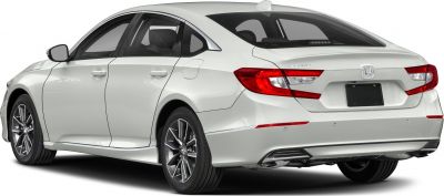 Rear side view of a sedan with sleek taillights and alloy wheels