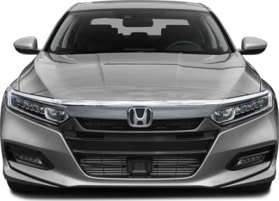 Front view showing LED headlights and prominent grille