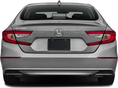 Rear view with distinct tail light cluster and trunk design