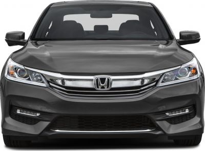 Front view with chrome grille and modern headlights