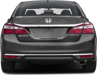 Rear view with taillights, chrome trim, and single exhaust pipe
