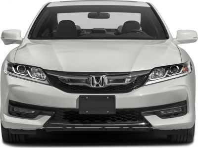 Front view with headlights, grille, and bumper of a modern coupe