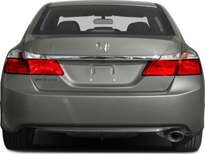 Rear view with tail lights, chrome decorative trim, and single exhaust pipe