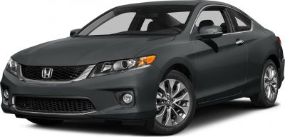 Sporty coupe front side with alloy wheels and signature grille