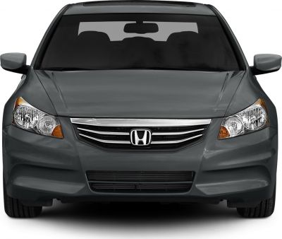 Front view with chrome grille and distinctive headlights
