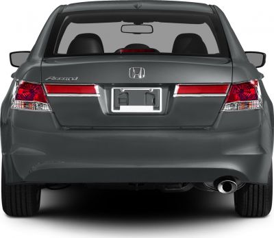 Rear view of midsize sedan with distinct taillights and single exhaust pipe