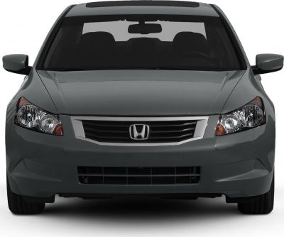 Front view featuring headlights and grille design of a mid-size sedan.