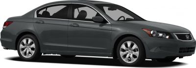 Side profile of a grey sedan with alloy wheels and sharp headlights