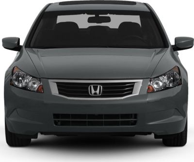 Front view with grille, headlights, and side mirrors
