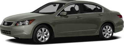 Four-door mid-size sedan with alloy wheels and streamlined body