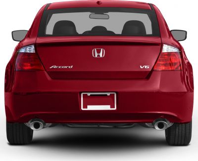 Rear view focusing on tail lights and dual exhaust pipes