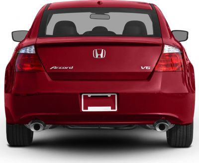 Rear view with dual exhaust and V6 badge on coupe taillights