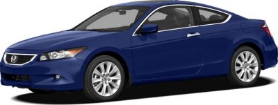 Front side view of a sleek two-door coupe with alloy wheels