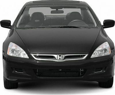 Front view showing grille and headlights of a coupe
