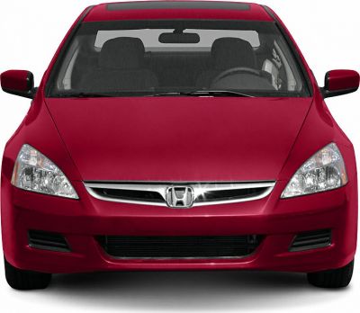 Front view showing headlights, chrome grille, and aerodynamic hood.