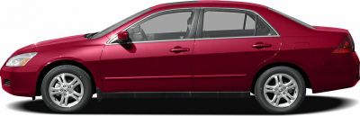 Red four-door sedan with alloy wheels and smooth design lines