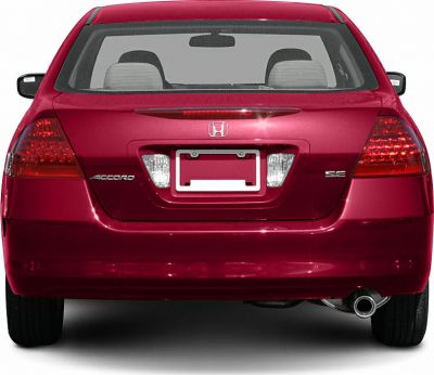 Rear view of a sedan with integrated taillights and single exhaust pipe