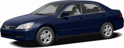 Blue sedan with front-side view, alloy wheels, four-door design