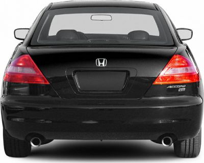 Rear view with dual exhaust and distinct tail lights