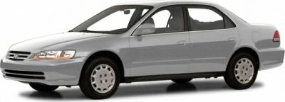 Silver four-door sedan side profile with alloy wheels