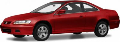 Red two-door coupe with alloy wheels and sloping roofline.