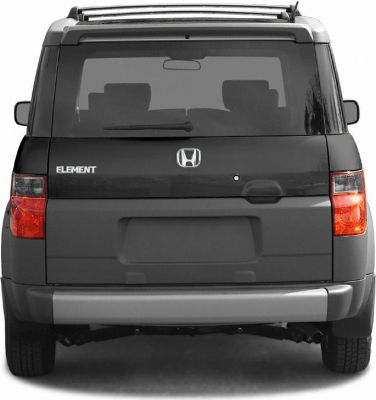 Rear view with tailgate, rear window, taillights, and bumper.
