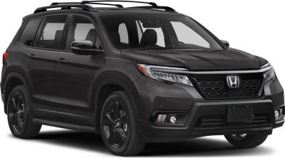 Black SUV with front grille, roof rails, and sporty wheels