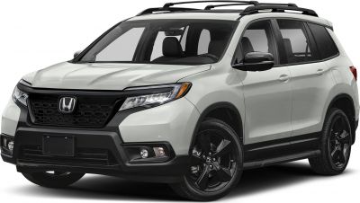 Modern SUV with black grille, LED headlights, and black alloy wheels.