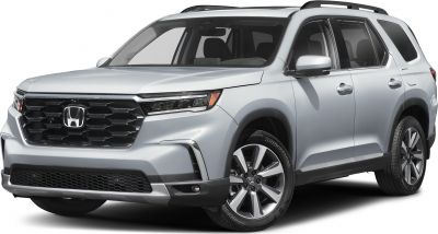 Front side view of SUV with grille, headlights, and alloy wheels
