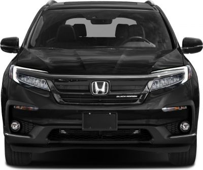 Front view of black SUV with LED headlights and Black Edition badge.