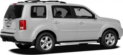 Side and rear view of SUV with roof rails and running boards
