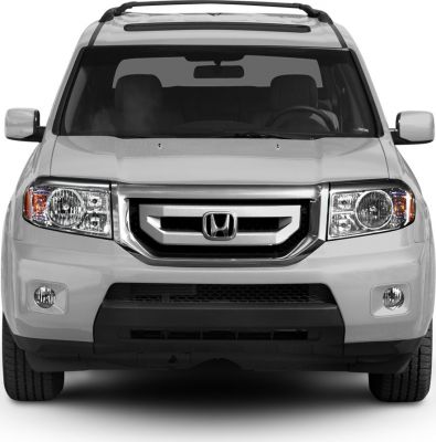 Front view showing grille, headlights, and fog lamps.