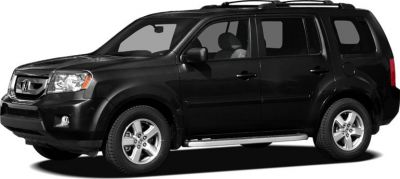 Side profile of black SUV with chrome side steps and alloy wheels