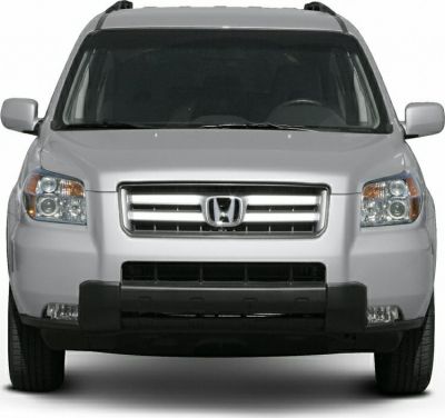 Front view of a silver midsize SUV with chrome grille and multi-section headlights.
