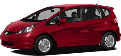Side profile of a compact hatchback with sleek aerodynamic design and silver wheel covers.