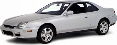 Silver two-door coupe with sealed beam headlamps and 5-spoke alloy wheels