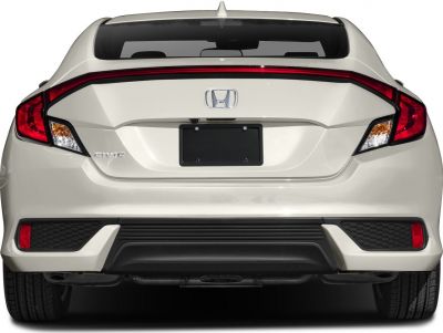 Rear view showing distinctive tail lights and rear bumper of a coupe.