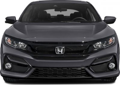 Front view with headlights, grille, and fog lights