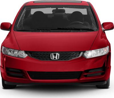 Front view of a red coupe with distinct grille and headlights