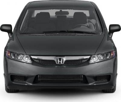 Front view with distinctive headlights and sleek grille