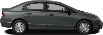 Side profile of a four-door sedan with streamlined body and hubcap wheels
