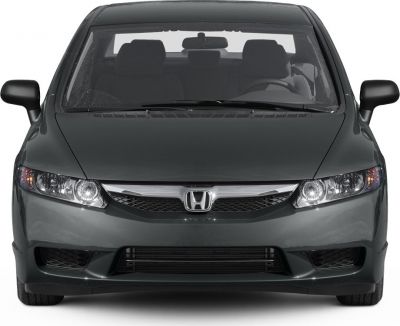 Front view with chrome grille and headlights