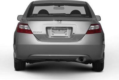 Rear view with tail light, trunk, and exhaust pipe