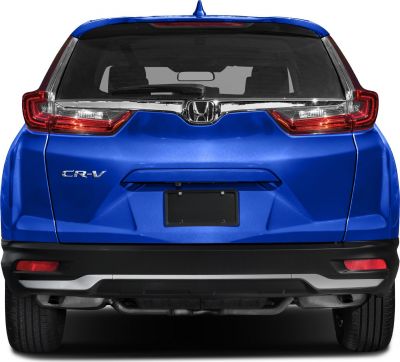 Rear view showing tail lights, rear window, and chrome trim with rear emblem